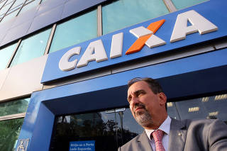 State-controlled lender Caixa Economica Federal CEO Occhi poses for Reuters in Sao Paulo