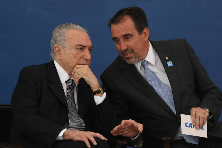 Os presidentes da República, Michel Temer, e da Caixa Econômica Federal, Gilberto Occhi, em cerimônia realizada no Palácio do Planalto
