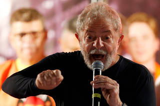 Former Brazilian President Luiz Inacio Lula da Silva speaks during a rally in Curitiba
