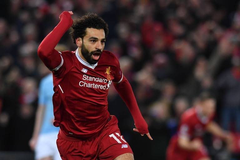 Meia egípcio Salah comemora o primeiro gol do Liverpool na vitória por 3 a 0 sobre o Manchester City, em Anfield