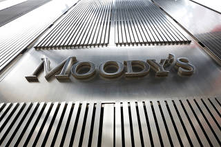 FILE PHOTO: A Moody's sign is displayed on 7 World Trade Center, the company's corporate headquarters in New York