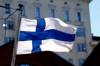 FILE PHOTO: Finland's flag flutters in Helsinki