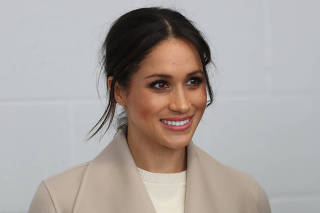 Meghan Markle smiles during a visit to the Eikon Exhibition Centre in Lisburn