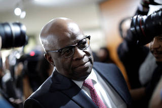 Joaquim Barbosa, former Chief Justice in Brazil, is seen before a meeting with PSB Election Commission in Brasilia