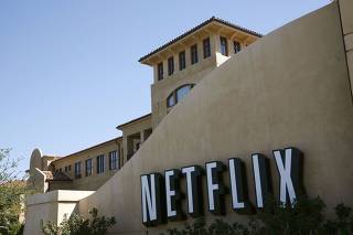 File photo of a sign at the headquarters of Netflix in Los Gatos