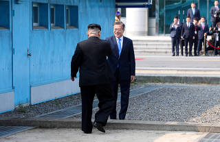 South Korean President Moon Jae-in and North Korean leader Kim Jong Un meet in the truce village of Panmunjom