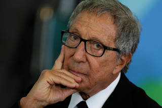 Abilio Diniz, the third largest Carrefour shareholder gestures during a meeting of the Council for Economic and Social Development (CDES) at the Planalto Palace in Brasilia