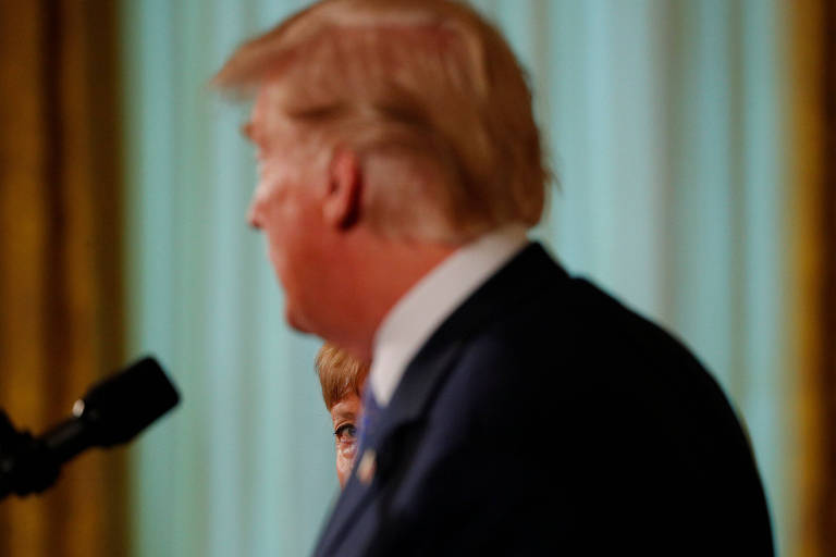 O presidente americano Donald Trump com a chanceler alemã Angela Merkel 