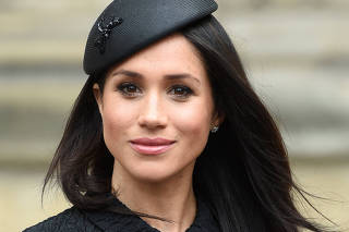 Meghan Markle, the fiancee of Britain's Prince Harry, attends a Service of Thanksgiving and Commemoration on ANZAC Day at Westminster Abbey in London