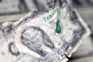 U.S. dollar banknote is seen in this picture illustration