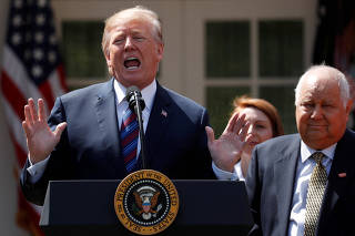 FILE PHOTO: U.S. President Trump gives remarks on tax cuts for American workers during an event at the White House in Washington