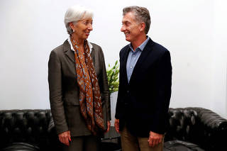 FILE PHOTO: Christine Lagarde, Managing Director of the IM) and Argentina's President Mauricio Macri pose for a picture at the Olivos presidential residence in Buenos Aires