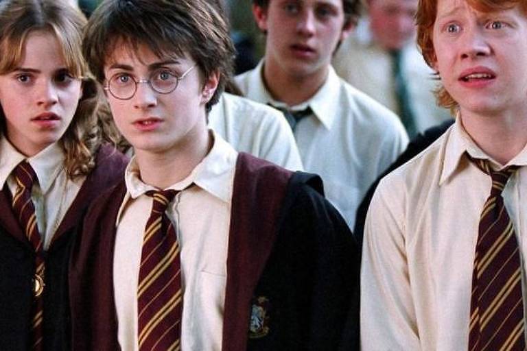 Cena de filme da saga Harry Potter, com Emma Watson (Hermione), Daniel Radcliffe (Harry) e Rupert Grint (Rony) 