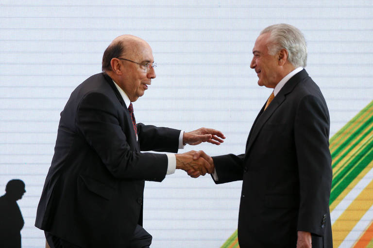 O ex-ministro da Fazenda Henrique Meirelles, à esq., e o presidente Michel Temer no encontro do MDB
