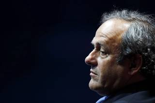 File picture shows UEFA President Platini during the draw ceremony for the 2014/2015 Champions League soccer competition in Monaco