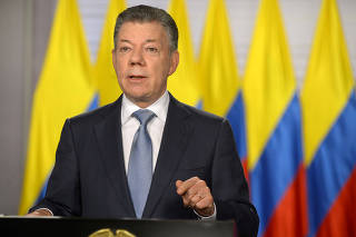 Colombia's President Juan Manuel Santos gives a speech to the nation in Bogota
