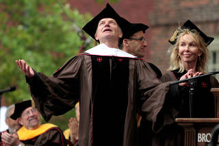 Sting gestures as he receives honorary doctorate degree during Brown University 250th Commencement ceremony in Providence