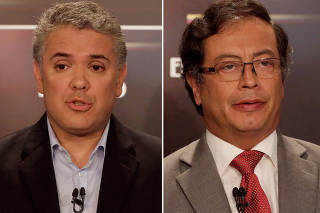 A combination picture shows Colombian presidential candidate Ivan Duque and Colombian presidential candidate Gustavo Petro take part in a presidential debate,in Bogota
