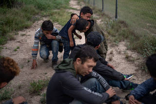 A boy weeps after being appreheaded after illegally crossing into the U.S. border from Mexico near McAllen, Texas, U.S.