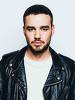 Liam Payne, integrante da banda britânica One Direction, interpreta una canción durante un concierto, como parte de su gira "Onde estamos", en el Estadio Centenario, pt Montevidéu, capital do Uruguai