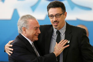 Sa Leitao, the new Minister of Culture is greeted by Brazil's President Temer during his inauguration ceremony, at the Planalto Palace, in Brasilia