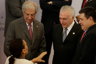 Argentina Vice President Gabriela Michetti talks with Paraguayan President Horacio Cartes, Brazil's President Michel Temer and Uruguay's President Tabare Vazquez after posing for an official photo at Mercosur trade bloc annual summit in Luque
