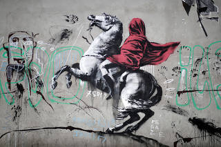 A recent artwork believed to be attributed to British activist-artist Banksy is pictured in Paris