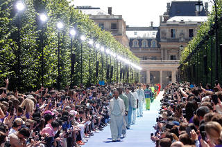 Models present creations by designer Virgil Abloh as part of his Spring/Summer 2019 collection show for Louis Vuitton fashion house during Men's Fashion Week in Paris