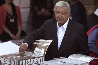 Candidate Obrador casts his ballot at a polling station during the presidential election in Mexico City