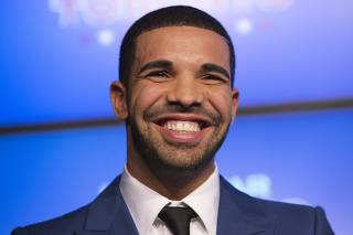 Drake smiles during an announcement that the Toronto Raptors will host the NBA All-Star game in Toronto
