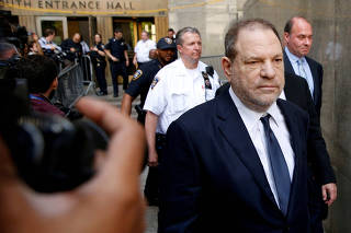 FILE PHOTO: Film producer Harvey Weinstein leaves court in Manhattan