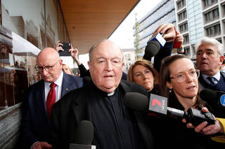 Archbishop Philip Wilson leaves Newcastle Local Court
