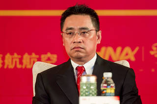 Wang Jian, Co-Chairman of HNA Group attends a meeting marking the 20th anniversary of company's founding in Haikou, Hainan