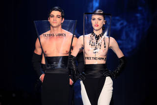 Models present creations by French designer Jean Paul Gaultier as part of his Haute Couture Fall/Winter 2018/2019 collection show in Paris