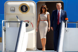 U.S. President Donald Trump and First Lady Melania Trump arrive aboard Air Force One, for their first official visit to Britain, at Stansted Airport