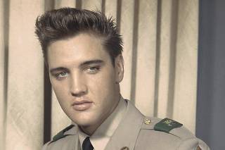 Handout photo of Elvis Presley is seen in his army uniform