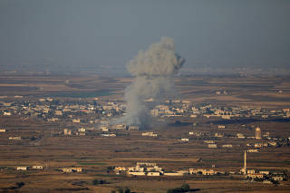 Smoke following an explosion in Syria is seen from the Israeli-occupied Golan Heights near the Israeli Syrian border
