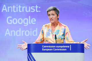 European Competition Commissioner Margrethe Vestager addresses a news conference on Google in Brussels
