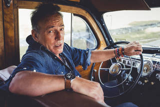 Bruce Springsteen in his 1948 Ford Woody on his property in Colt?s Neck, N.J.