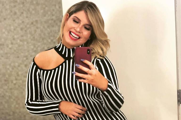 Cantora sertaneja Marilia Mendonça posa para foto após perder 15 quilos