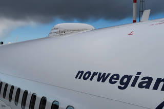 FILE PHOTO: A satellite antenna is seen on a Norwegian Air Boeing 737-800 at Berlin Schoenefeld Airport