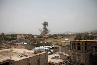 Smoke rises after an airstrike in Sanaa