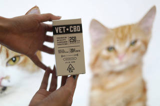 The Vet CBD Pet Cannabis Company booth is seen at CatCon in Pasadena