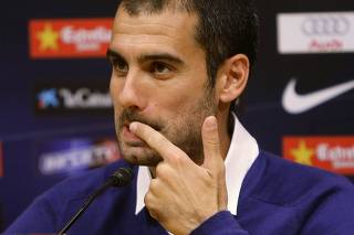 Barcelona's coach Guardiola attends news conference at Nou Camp stadium in Barcelona