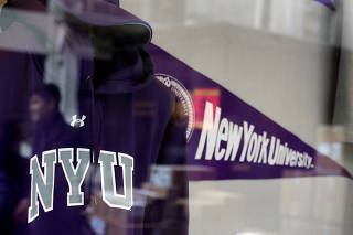 FILE PHOTO: A sweatshirt and pennant are seen inside the bookstore at New York University in New York