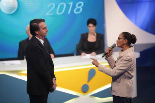 Marina Silva (Rede) confronta Jair Bolsonaro (PSL) durante debate