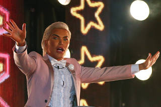 Contestant Rodrigo Alves arrives as the reality show 'Celebrity Big Brother' starts, in Elstree