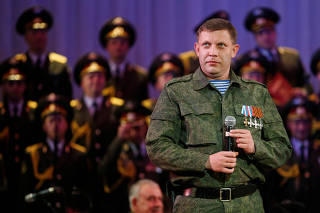 FILE PHOTO: Alexander Zakharchenko, separatist leader of the self-proclaimed Donetsk People's Republic, sings during a concert in Donetsk