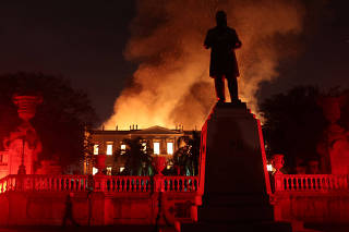 Firefighters try to extinguish a fire at the National Museum of Brazil in Rio de Janeiro