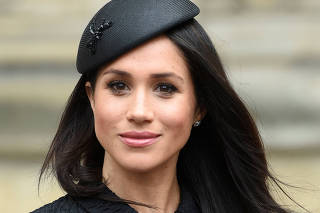 Meghan Markle, the fiancee of Britain's Prince Harry, attends a Service of Thanksgiving and Commemoration on ANZAC Day at Westminster Abbey in London